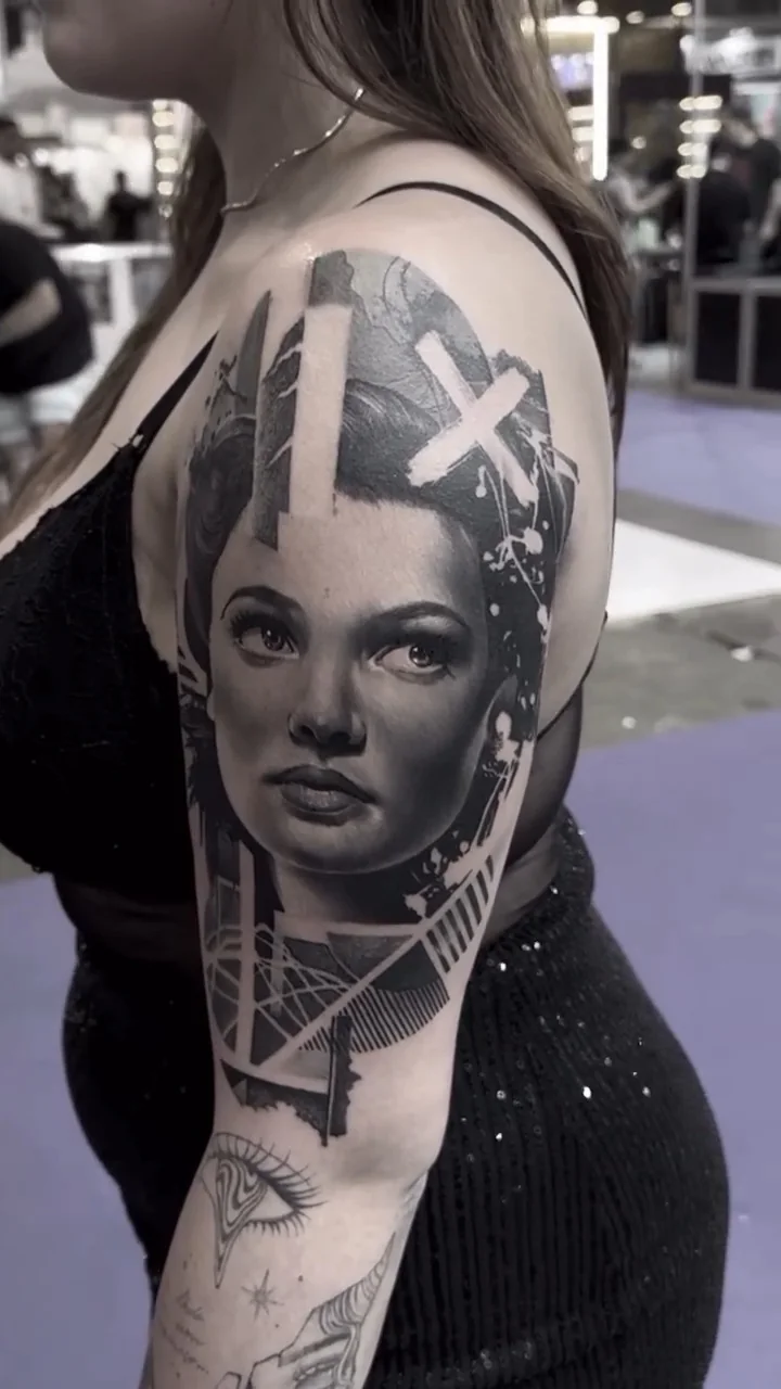 a woman's portrait framed by a white cross and tower structures, black and grey realism tattoo by Victor Armero, Plymouth