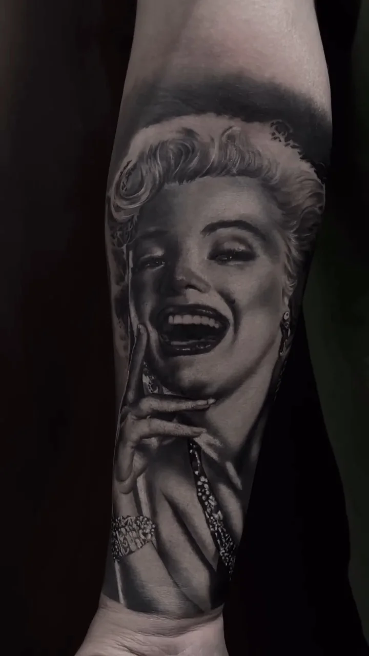 a laughing Marilyn Monroe portrait, STYLE tattoo by ARTIST NAME, NEIGHBOURHOOD CITY